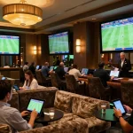KQBD sports betting action with enthusiasts analyzing matches in a luxurious lounge.
